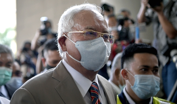 Najib to serve 12 years in jail, fined RM210m. BERNAMA
