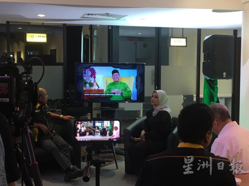 霹雳州务大臣拿督斯里阿末法依沙通过预录视频方式致词。
