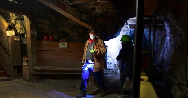 Miner Doug Graeme leads a tour out of the Copper Queen Mine, which opened in 1877. AFP