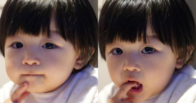 单文柔与丈夫陈展鹏的宝贝女小猪比已经1岁大，眼大大似妈妈般漂亮。