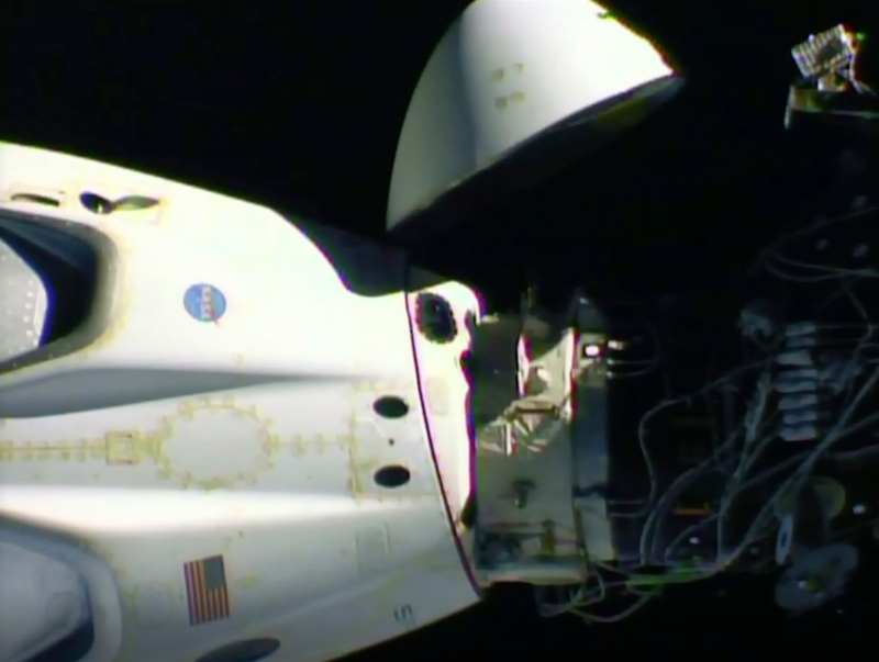 NASA公布的视频显示，SpaceX“飞龙船”正准备脱离国际太空站重返地球。（美联社照片）