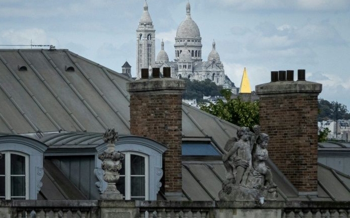 The Goutte d'Or is a stone's throw from the emblematic artists' quarter of Montmartre and its famous Sacre Coeur basilica in Paris's touristy 18th arrondissement, but a world apart. AFP