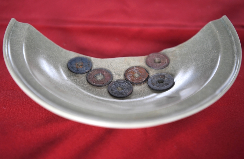 随之出土的还包括相信是唐代、宋代及明代的硬币。（图：马新社）