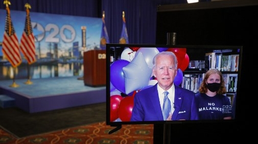 Biden reacts in a video feed from Delaware after winning the votes to become the Democratic Party's 2020 nominee for president on the second day of the Democratic National Convention held virtually at its hosting site in Milwaukee, Wisconsin. AFP