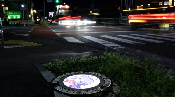Tokorozawa is reimagining the possibilities with illuminated manhole covers featuring anime characters to attract visitors. AFP