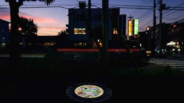 The illuminated manhole covers in the Japanese city have been met with enthusiasm from manhole fans and local residents. AFP