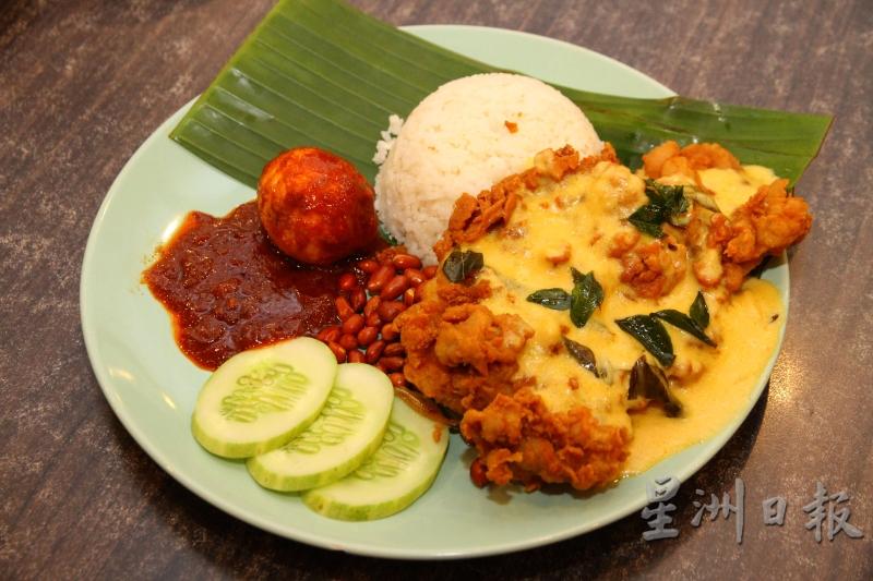 奶油鸡扒椰浆饭 RM14.90--份量十足的鸡扒椰浆饭可说是“大份夹抵吃”，因而相当受年轻人的欢迎，周末时更有可能卖断货。