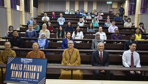 Academic staff of Faculty of Arts and Social Sciences and Fo Guang Shan Malaysia representatives in a group photo at the refurbished lecture hall.