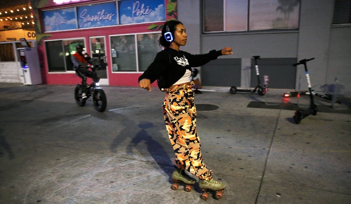 People roller skating along the Venice Beach boardwalk in Venice, California, during the coronavirus pandemic in search of outdoor activities amidst lifestyle restrictions due to the virus. AFP People roller skating along the Venice Beach boardwalk in Venice, California, during the coronavirus pandemic in search of outdoor activities amidst lifestyle restrictions due to the virus. AFP