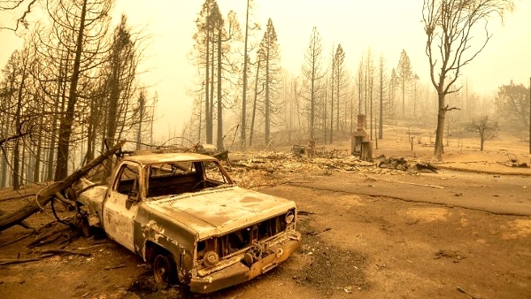 A vehicle burned by the Creek fire smolders in an unincorporated area of Fresno County, in California's central valley. AFP A vehicle burned by the Creek fire smolders in an unincorporated area of Fresno County, in California's central valley. AFP