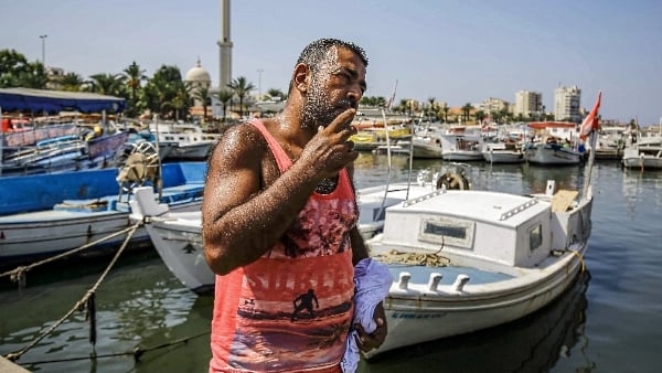 Khaled Abdallah, 47, said life in Lebanon was no longer sustainable working 17-hour shifts as a school security guard for around $3 a day. AFP