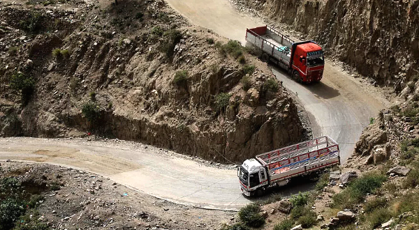 Convoys of vehicles big and small move at a snail's pace as they squeeze past each other on a dangerous road that links Yemen's Taez to the rest of the war-torn country. AFP