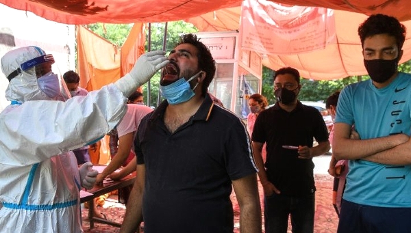 A man is tested for coronavirus in Ghaziabad.