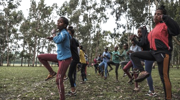 Hanna Awugichew (L) trains with other runners in a forest in Bekoji, known for producing running phenoms who have collectively bagged 18 Olympic medals. AFP