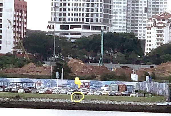 Mohd Izwan's family members were standing at the JB beach trying to see him on the opposite side of Johor Straits. Mohd Izwan's family members were standing at the JB beach trying to see him on the opposite side of Johor Straits.