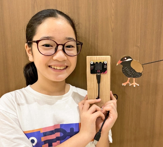 小川以“冲绳秧鸡的千钧一发”作品获得优秀奖。