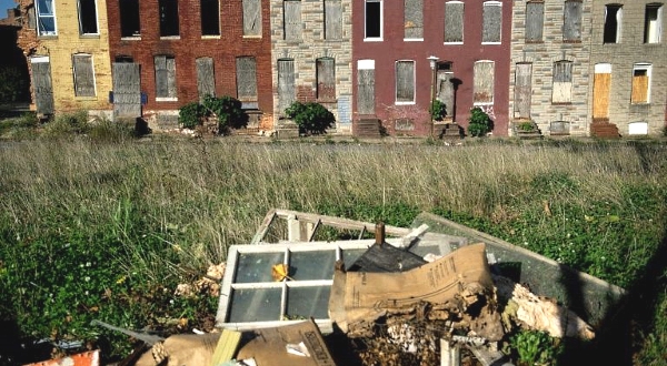 Boarded up rowhouses and piles of trash are common sights in the poor neighborhoods of East Baltimore. AFP