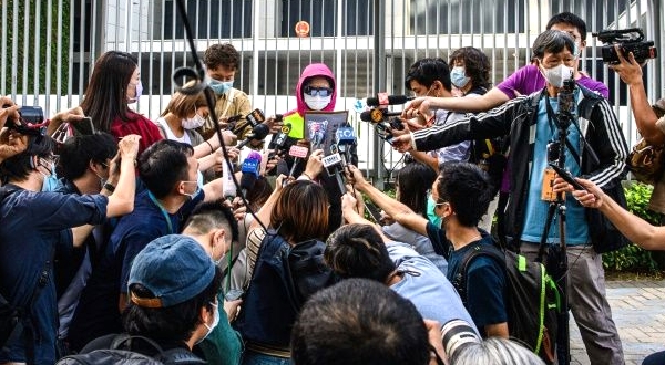 Poon's mother (C) has cut a tragic figure, shuttling between Hong Kong ministries and urging officials to break the legal deadlock on Chan's extradition to Taiwan. AFP Poon's mother (C) has cut a tragic figure, shuttling between Hong Kong ministries and urging officials to break the legal deadlock on Chan's extradition to Taiwan. AFP