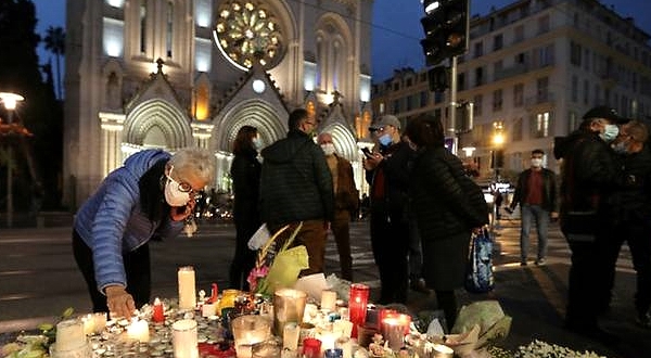People leave tributes to victims of the attack outside the Nice church. AFP People leave tributes to victims of the attack outside the Nice church. AFP