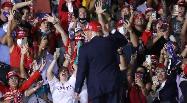 Supporters cheer as Trump makes a campaign stop at Miami-Opa Locka Executive Airport. AFP Supporters cheer as Trump makes a campaign stop at Miami-Opa Locka Executive Airport. AFP