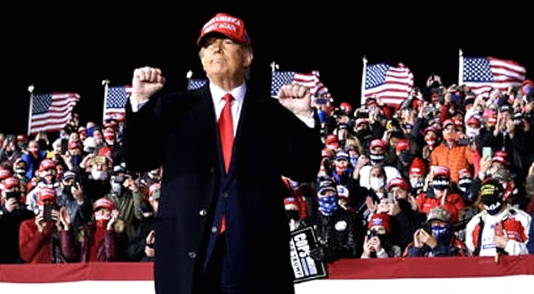Trump gestures during a rally at Southern Wisconsin Regional Airport in Janesville, Wisconsin. AFP Trump gestures during a rally at Southern Wisconsin Regional Airport in Janesville, Wisconsin. AFP