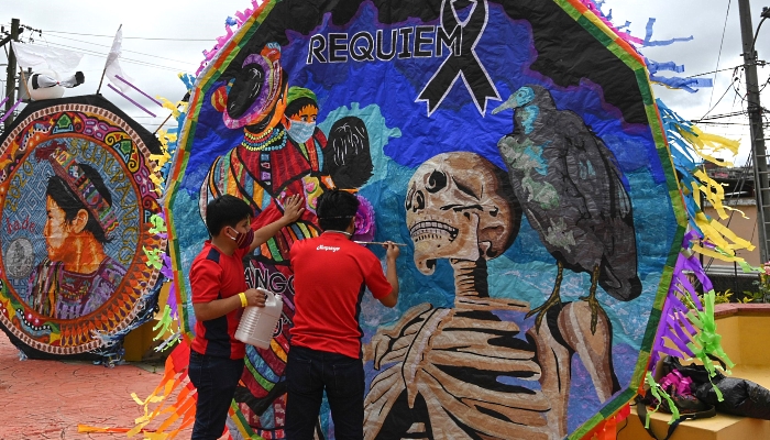 Colorful giant kites during the All Saints' Day celebration in Santiago Sacatepequez some 48km west of Guatemala City in Guatemala. AFP Colorful giant kites during the All Saints' Day celebration in Santiago Sacatepequez some 48km west of Guatemala City in Guatemala. AFP