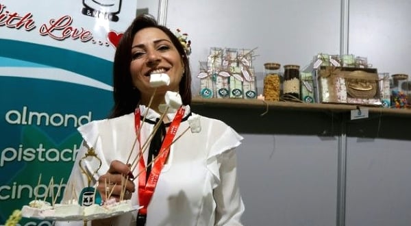 Sonali Ghazal displays Aleppo-made marshmallows scented with rose water or pistachios. AFP Sonali Ghazal displays Aleppo-made marshmallows scented with rose water or pistachios. AFP