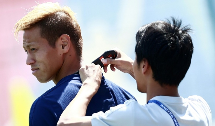 Japan midfielder Keisuke Honda has a GPS tracker device fitted during training at the 2018 World Cup in Russia. AFP Japan midfielder Keisuke Honda has a GPS tracker device fitted during training at the 2018 World Cup in Russia. AFP