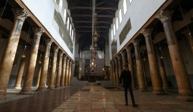 Bethlehem's Church of the Nativity is normally crammed with visitors but the site is nearly empty because of coronavirus. AFP