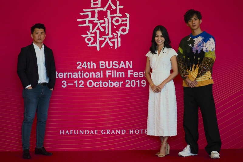 《菠萝蜜》去年10月在釜山影展的电影殿堂进行世界首映，左起为导演廖克发、表演指导陈雪甄和男主角吴念轩。
