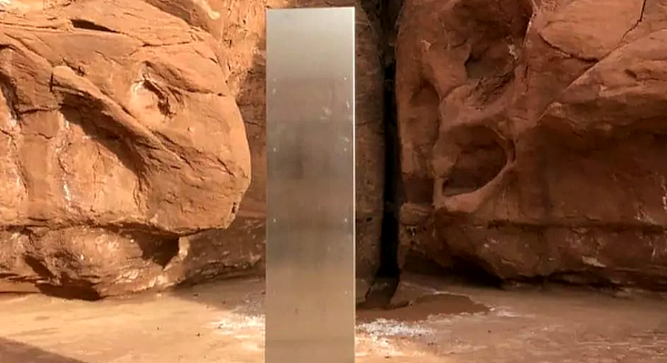 The shiny, triangular pillar protruding approximately 12 feet from the red rocks of southern Utah was spotted by baffled local officials counting bighorn sheep from the air Handout Utah Department of Public Safety. AFP The shiny, triangular pillar protruding approximately 12 feet from the red rocks of southern Utah was spotted by baffled local officials counting bighorn sheep from the air Handout Utah Department of Public Safety. AFP
