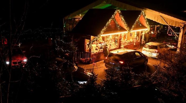 People visit a drive-in Christmas market in Landshut. AFP