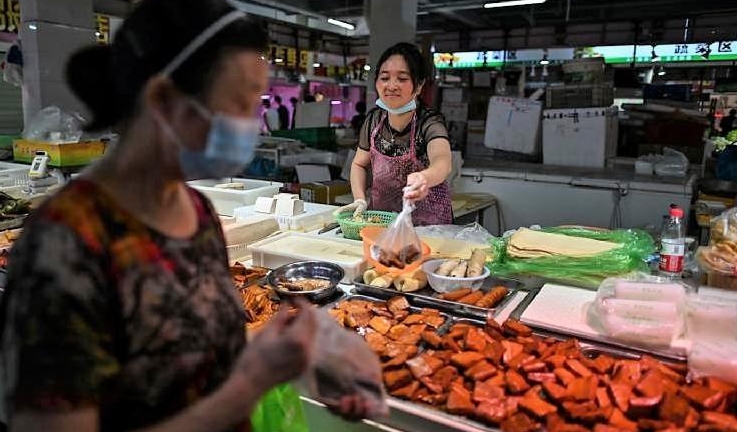 Early virus cases were linked to a market in Wuhan, but it could have originated elsewhere. AFP Early virus cases were linked to a market in Wuhan, but it could have originated elsewhere. AFP