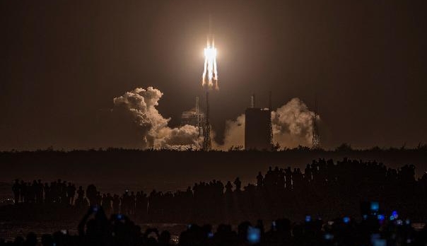 A Long March 5 rocket carrying Chang'e-5 lunar probe launches from the Wenchang Space Center in Hainan. AFP A Long March 5 rocket carrying Chang'e-5 lunar probe launches from the Wenchang Space Center in Hainan. AFP