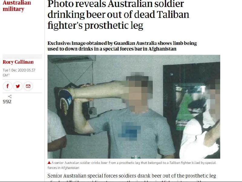 卫报1日披露数张照片，照片中一名澳洲特战士兵在阿富汗一家酒吧中，用死去的塔利班士兵义肢当作酒杯。（图取自卫报网页theguardian.com）