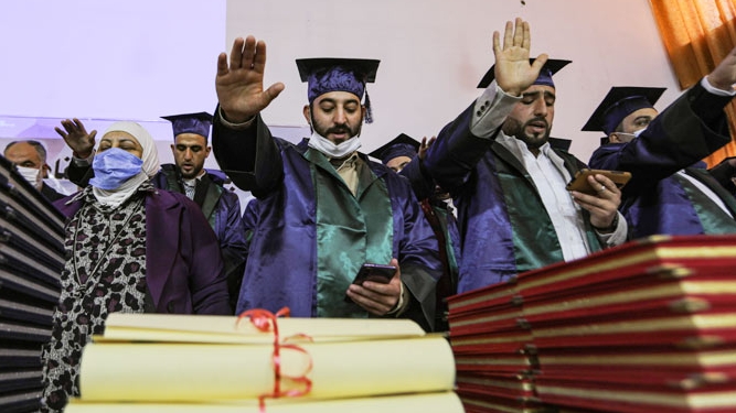 Aleppo University students attending their graduation ceremony at the campus in Azaz. AFP