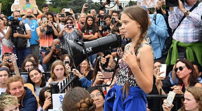 Greta Thunberg speaks at a climate protest outside the White House in Washington, DC. AFP