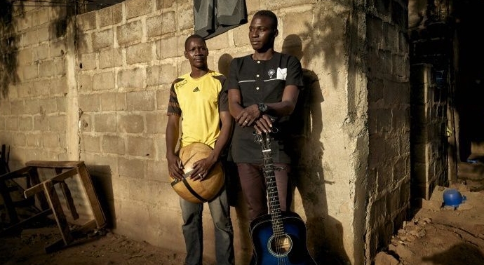 Amadou Guindo (L) and Ali Traore are members of the band 