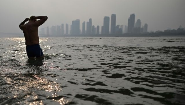 Inspired by Mao, Wuhan river swimmers 'reborn' after virus lockdown. AFP