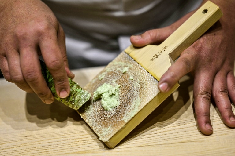 The root is grated and served with raw fish, or soba noodles. AFP