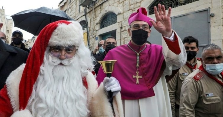 The Latin Patriarch of Jerusalem, Archbishop Pierbattista Pizzaballa, attends Christmas celebrations in Bethlehem. AFP