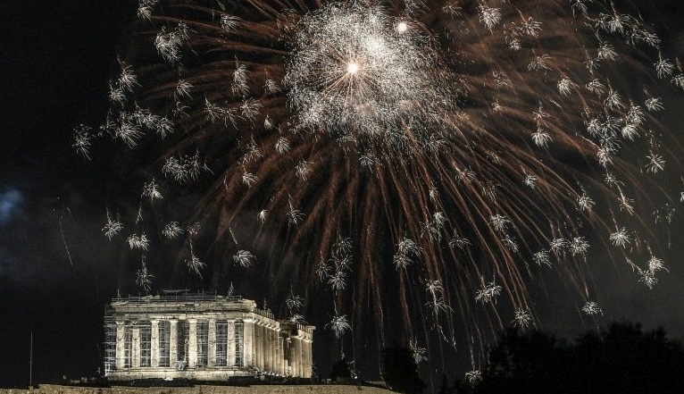 Fireworks explode over the ancient Acropolis in Athens during the new year's celebrations. AFP