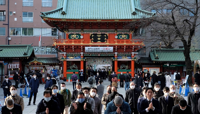 People pray on the first business day of the year at Kanda Myojin Shrine in Tokyo. AFP