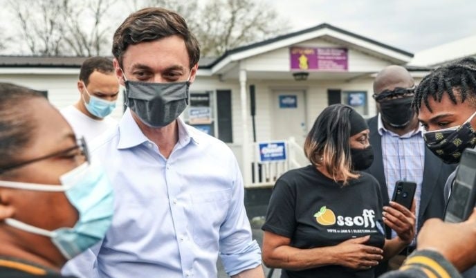 Democratic Senate candidate Jon Ossoff talks to supporters in Eatonton, Georgia. AFP Democratic Senate candidate Jon Ossoff talks to supporters in Eatonton, Georgia. AFP