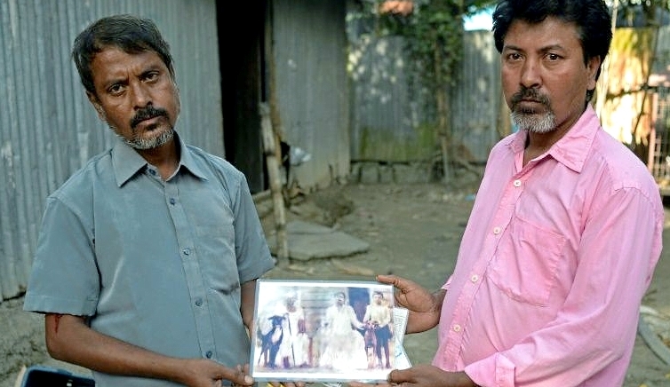Joton Rabidas (R) and Topon Rabidas are among the last local breeders of the Sarail hound in Bangladesh. AFP