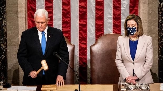 Vice President Mike Pence and House Speaker Nancy Pelosi preside over a Joint session of Congress to certify the 2020 Electoral College results. AFP