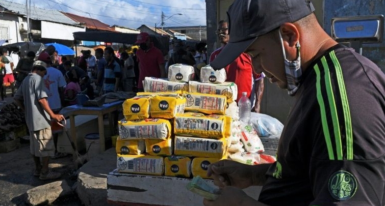 Product prices in Venezuela, already battered by the highest inflation in the world, are even more out of reach in remote areas such as Guiria, some 400 miles east of Caracas. AFP