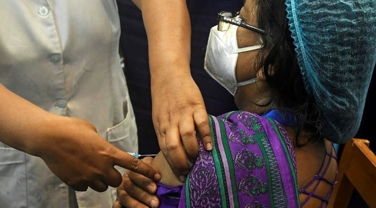 Authorities in India aim to inoculate 300 million people by mid-year. Authorities in India aim to inoculate 300 million people by mid-year.