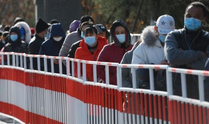 Residents line up to be tested for coronavirus in Beijing after new cases emerged in Hebei province. Residents line up to be tested for coronavirus in Beijing after new cases emerged in Hebei province.
