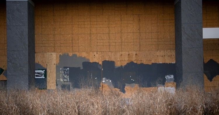 Boarded-up premises have become common across the US capital. AFP